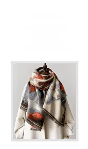 Close-up detail of double-sided cashmere shawl with landscape oil painting and fringe