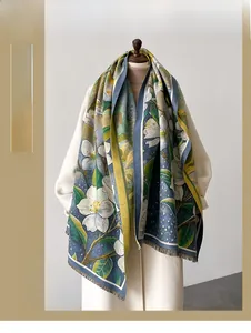 Close-up of white gardenia oil painting print and fine fringe on cashmere-like scarf