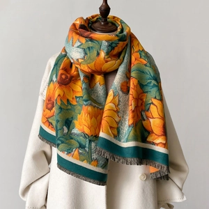 Elegant yellow sunflower jacquard pashmina scarf with fringe on a white coat mannequin