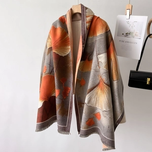 Thick autumn winter scarf with artistic ginkgo leaf pattern and elegant fringe edges