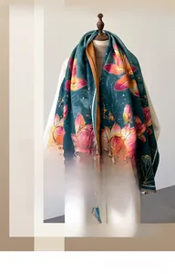 Close-up of thick winter pashmina shawl featuring pink lotus pattern and fringe tassels