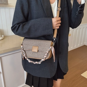 Retro plaid crossbody bag with silk scarf wrapped chain handle shown on model