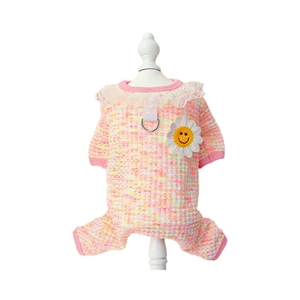 Pink knitted pet jumpsuit with lace collar and daisy detail on a white mannequin