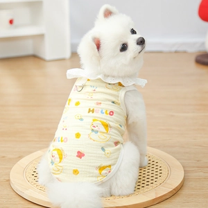 Close-up of cotton pet vest with cute duck print, lace collar, and metal D-ring attachment