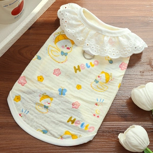Detail of pet vest showing white lace collar with embroidery and metal D-ring for leash