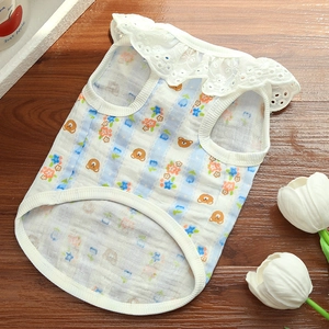 Close-up of lightweight blue striped cotton pet vest with lace collar and floral patterns