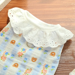 Detail of cotton dog vest featuring blue stripes, bear patterns, and lace collar detail