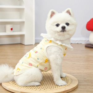 Close-up of yellow cotton pet vest with lace collar and cartoon hello print for small dogs