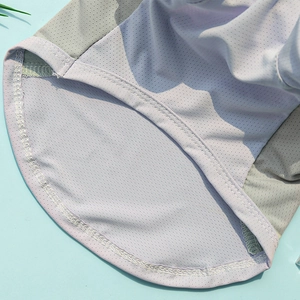 Detail of breathable mesh fabric in purple and grey with fine stitching for pet clothing