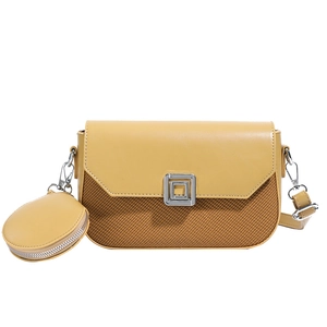 Crossbody square bucket bag with round coin purse and woven paneling on white background