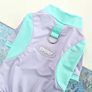 Detail of pet cooling vest showing breathable mesh, SPORT tag and metal D-ring for leash
