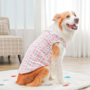 Detailed view of pink plaid cotton pet vest with cute bear print and lace collar
