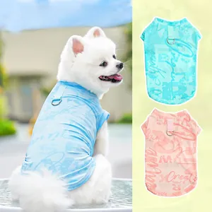 Macro detail of breathable ice silk pet vest with graffiti print and metal D-ring buckle