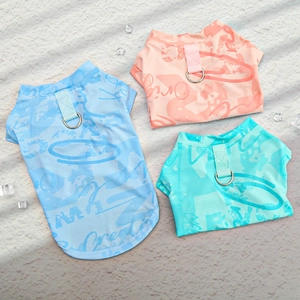 Close-up of breathable mesh pet vests in blue and orange with metal D-rings and ice cubes