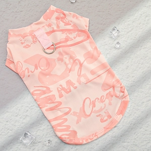 Detail of pink cooling dog vest showing breathable mesh fabric and a metal D-ring for leash