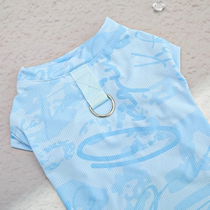 Detail of light blue cooling pet vest with mesh fabric and metal D-ring for leash