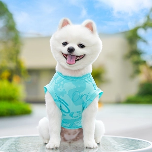 Detail of light blue cooling ice silk mesh pet vest with Ori lettering on a small dog