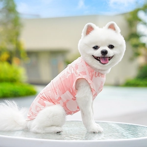 Pink ice silk cooling vest for dogs featuring a breathable knit fabric and abstract prints