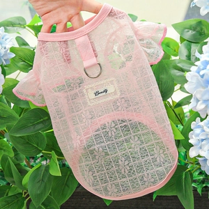 Detailed view of pink floral lace dog dress with D-ring attachment and airy mesh fabric