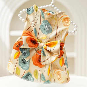 Detailed view of summer pet dress with 3D rose patterns and a metal D-ring for leash attachment