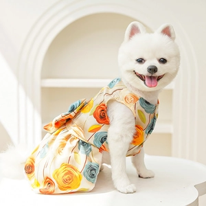 Detailed view of the 3D rose print and large bow on this elegant pet floral dress
