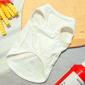 Close-up of breathable mesh pet cooling vest with cute fruit patterns on wooden surface