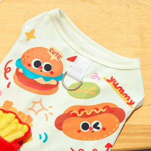 Macro detail of breathable mesh dog harness with cute 3D fries embroidery and D-ring