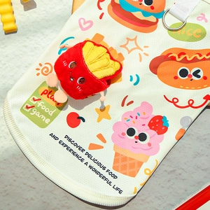 Detail of breathable dog mesh vest with cartoon food prints and a 3D fries charm