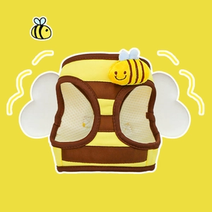 Detail of cute bee-style dog harness featuring yellow stripes and 3D plush wings