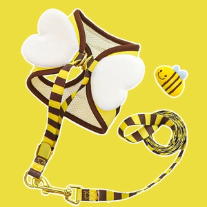 Detail of bee themed dog harness with white heart wings and breathable mesh fabric