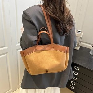 Große Shopper-Tasche aus braunem Wildleder und karamellfarbenem Leder für Damen
