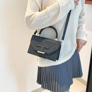 Elegant black glitter flap square bag with T-shaped buckle and crossbody strap for women