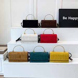 Rhombic quilted crossbody bags in seven colors with semi-circular gold metal handles