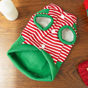 Detailed view of Christmas pet clothes with red-white stripes and green ribbed edges