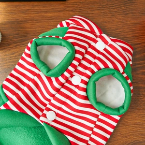 Close-up of dog Christmas pajamas with red-white stripes, green trim and warm fleece lining