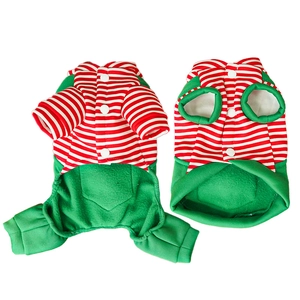 Detail of festive Christmas dog pajamas with red and white stripes and green cuffs