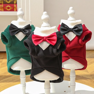 Three-piece formal pet suit in green, black, and red for dogs and cats on mannequin