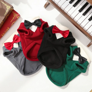 Detail of elegant pet tuxedo vests in grey, burgundy, black and green soft fleece
