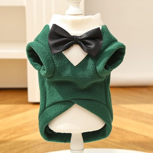 Close-up of dark green pet tuxedo sweater with white collar and black leather bowtie