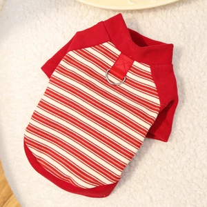 Detail of red and white striped pet vest with silver metal D-ring for leash attachment