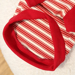Detail of red and white striped pet clothing showing neck stitching and soft cotton fabric