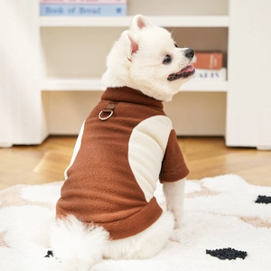 Detail of warm fleece pet sweatshirt with D-ring for leash attachment on dog