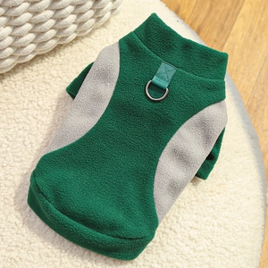 Detail of warm fleece pet vest with leash D-ring and green gray patchwork design