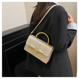 Chic cream-colored PU crossbody bag with elegant golden bamboo handle and M-buckle detail