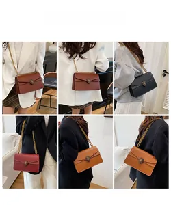 Detailed views of leather crossbody bags with lion head hardware and chain strap