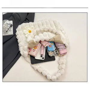 Detailed interior of plush tote bag showing capacity for tablet, umbrella and makeup