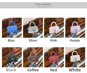 Collage of multi-color box bags with textured surface and metal charms on piano background