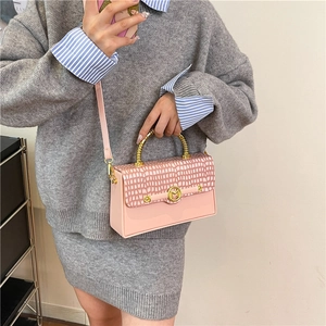 Pink PU leather crossbody square bag with crocodile pattern and golden spiral handle
