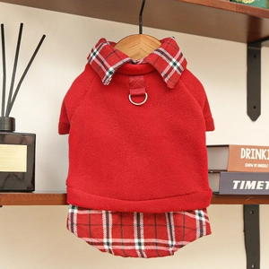 Detail of red fleece pet sweater with vintage plaid trim and metal D-ring for leash