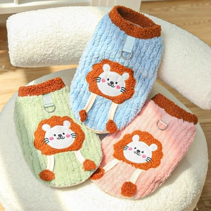 Detail of fleece pet vests with cartoon lion embroidery and metal D-ring for leash